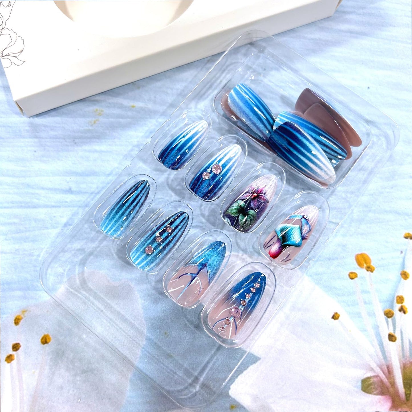 Blue Press on Nails Medium Almond Shaped Flower Pattern Design Gradient False Nail Glitter Rhinestones Artificial Acrylic Stick on Nails Press Ons with Design Stripes Manicure Glue on Nails for Women