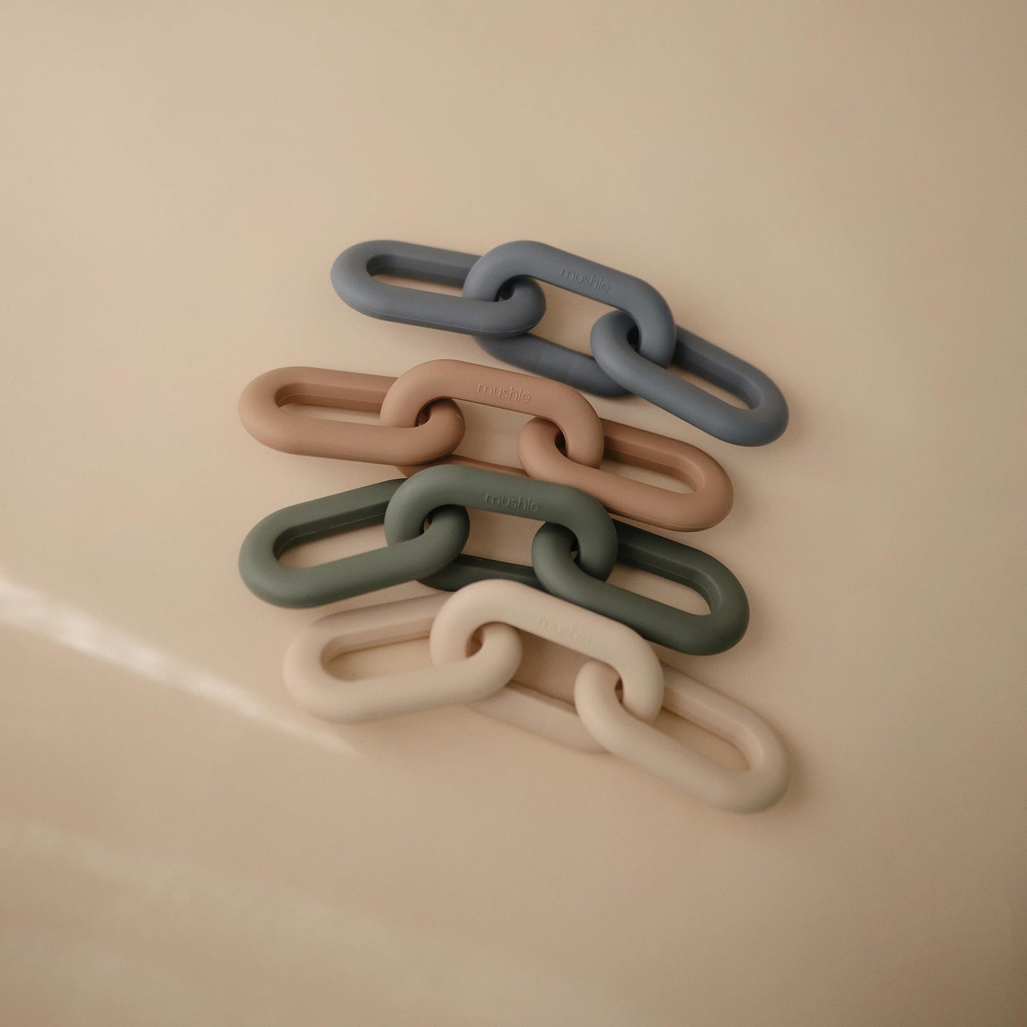 mushie Silicone Baby Links Teether Toy (Shifting Sand)
