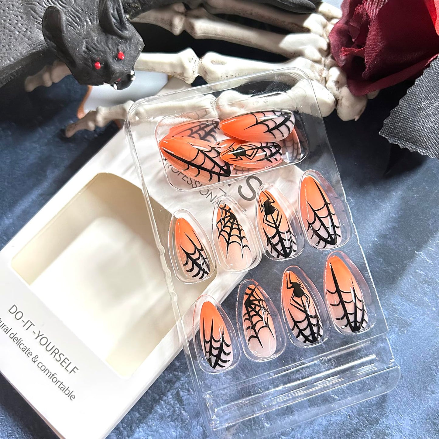 CJDLTS Halloween Spider Press on Nails Medium Almond Black Spider Web Spider Design Orange Gradient Halloween Nail Artificial Acrylic False Nails Full Cover Glossy Glue on Nails for Women 24Pcs