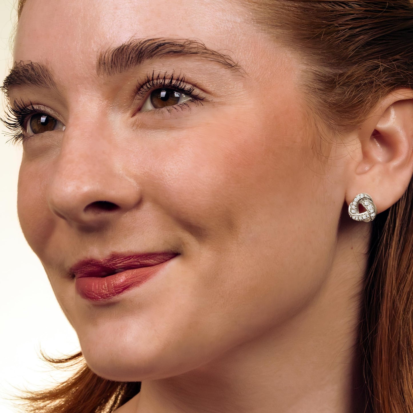 Gilded Sterling Silver 1/10 cttw Diamond Knot Post Earring