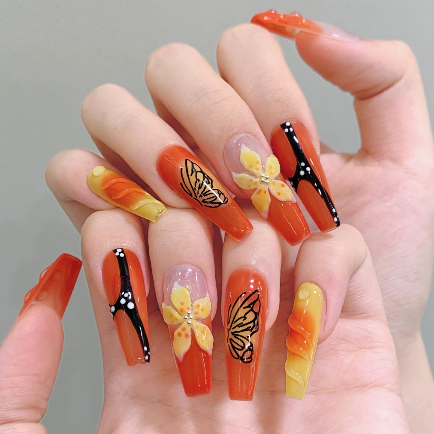 Tesytto Long Coffin Press On Nails - 3D Flowers Orange Design Hand-Painted Butterflies French Tip Acrylic Nail for Women (Mango Sago,M)