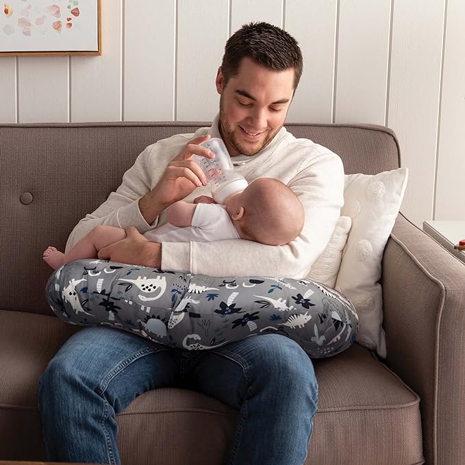 Boppy Original Nursing Pillow, Gray Dinosaurs, Ergonomic Nursing Essentials for Bottle and Breastfeeding, Firm Fiber Fill, with Removable Pillow Cover, Machine Washable