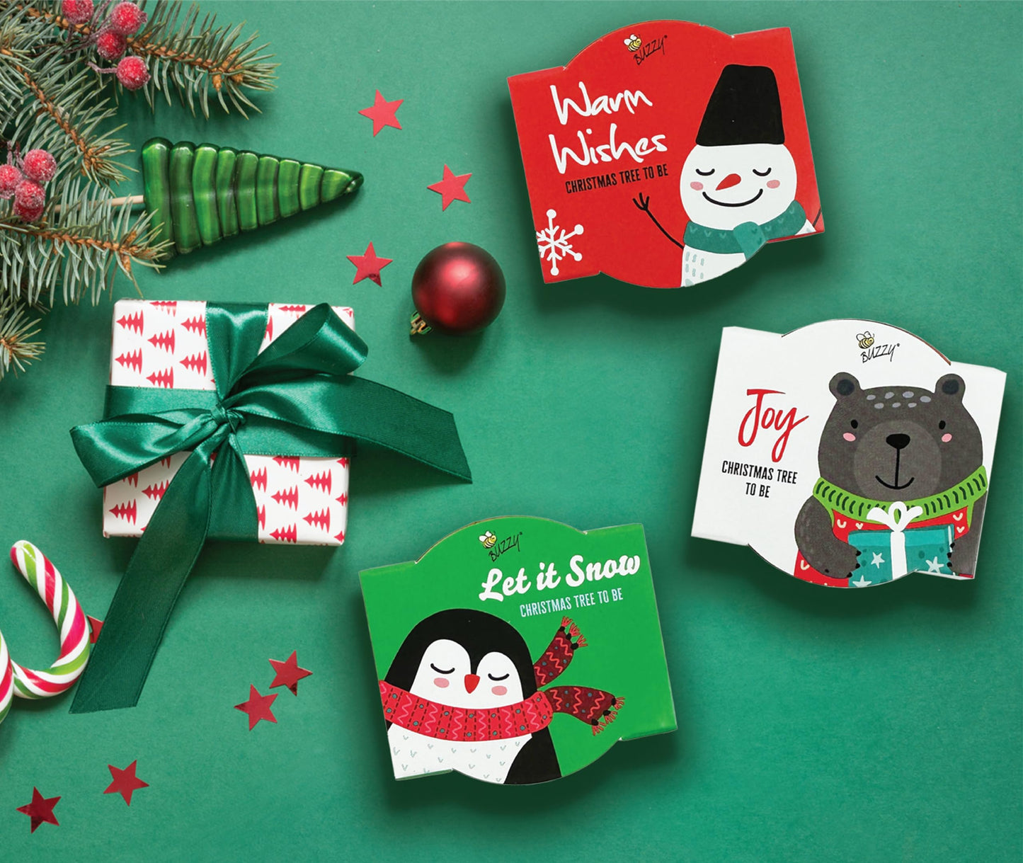 BUZZY Seeds Holiday Mini Spruce Kit 12-Pack – Terracotta Pots with Bear, Penguin, and Snowman Designs, All-in-One Tree Seed Starter Set, Stocking Stuffer, Party Favor