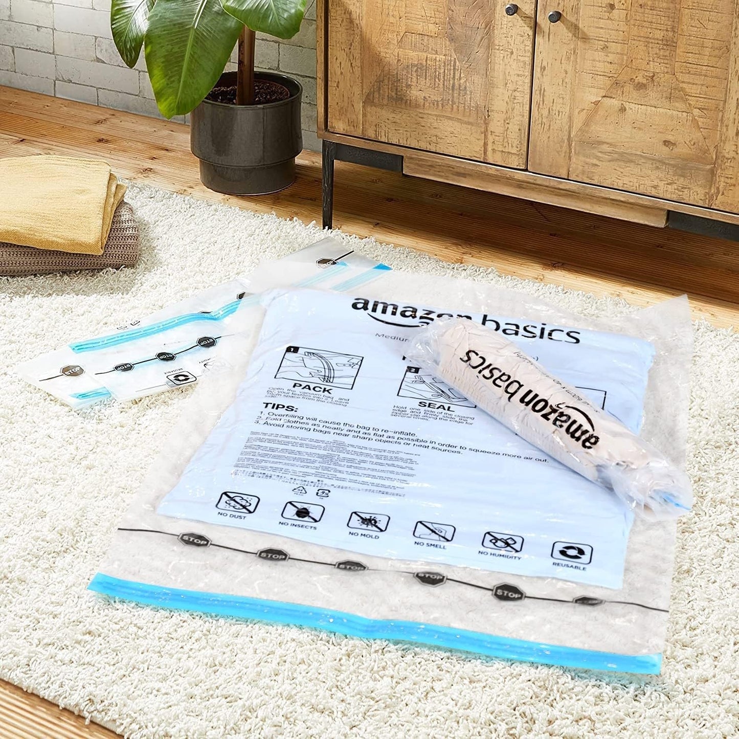 Amazon Basics Roll-Up Travel Compression Storage Bags for Clothes and Towels, No Vacuum Needed, Clear, 12 Pack (6 Small & 6 Medium)