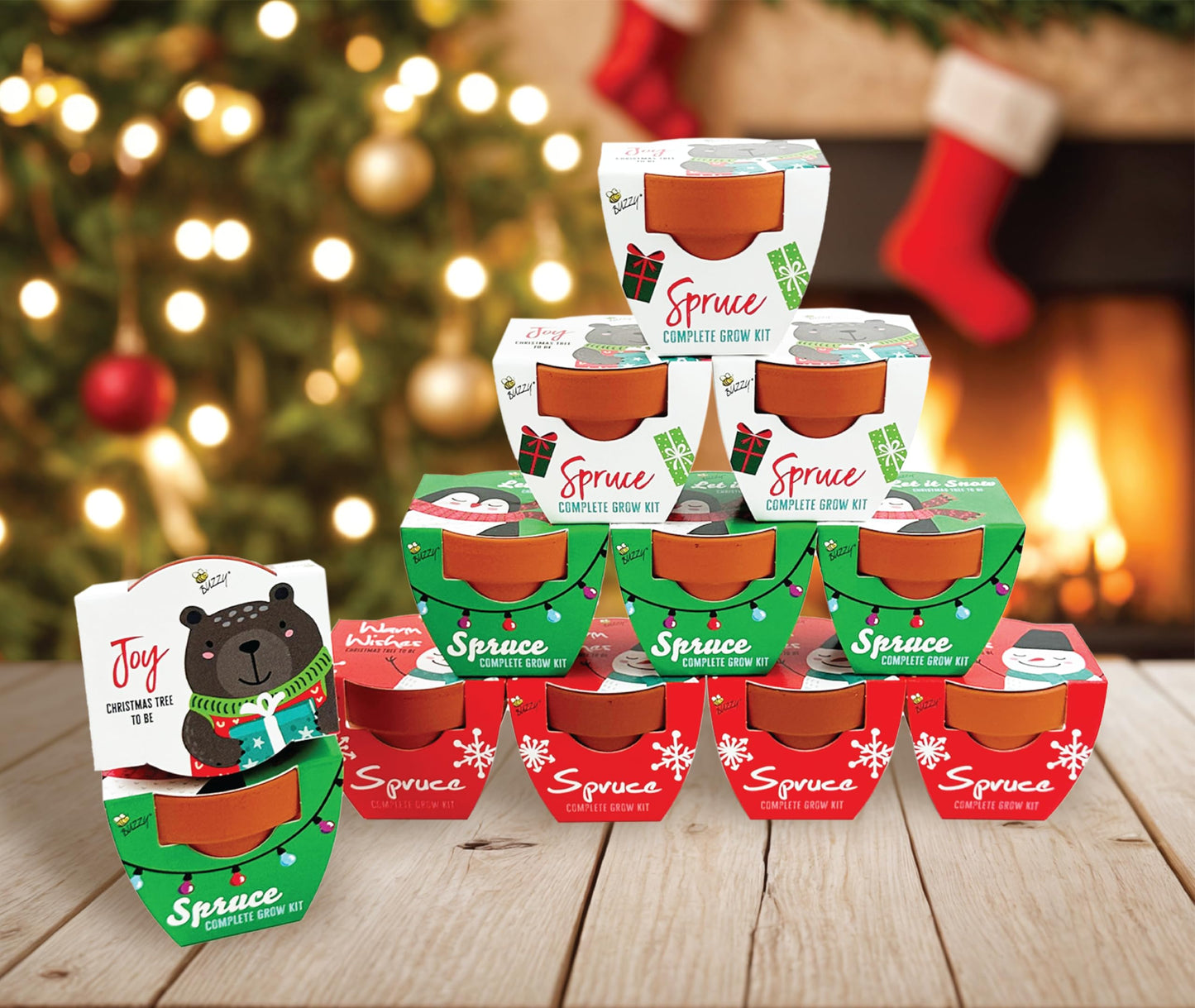 BUZZY Seeds Holiday Mini Spruce Kit 12-Pack – Terracotta Pots with Bear, Penguin, and Snowman Designs, All-in-One Tree Seed Starter Set, Stocking Stuffer, Party Favor