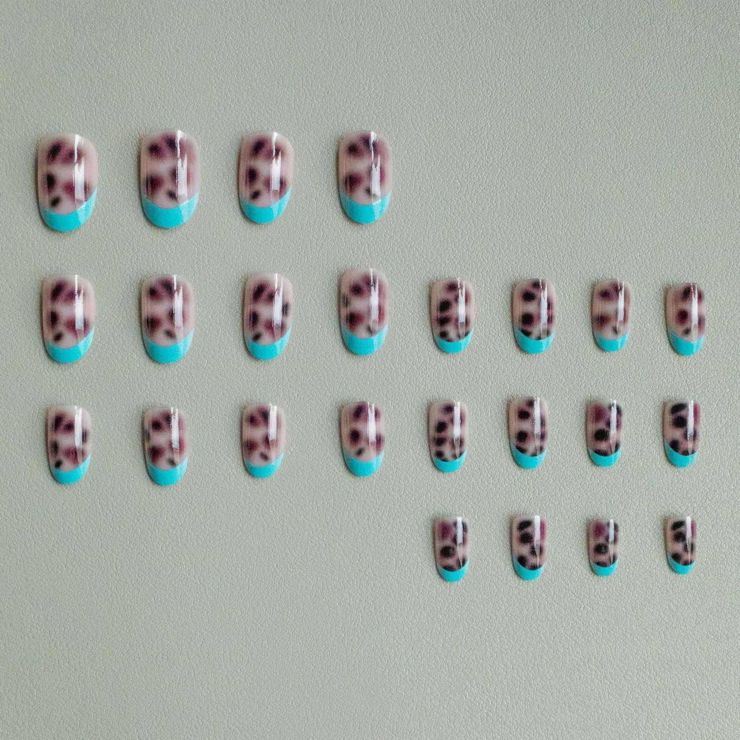 IMSOHOT Press on Nails Short Oval Fake Nails Blue French Tips Acrylic False Nails with Leopard Print Designs Round Glossy Glue on Nails for Women Girls 24Pcs