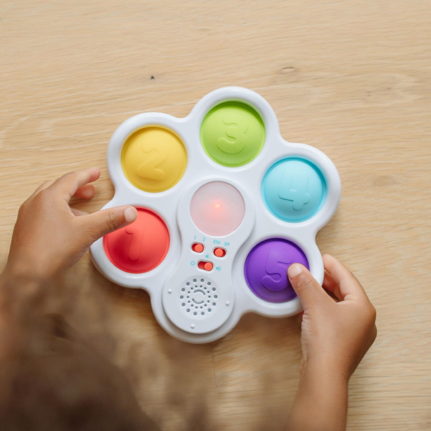 Chuckle & Roar - Pop It! and Learn - Educational and Electronic Popping Toy - Learn Numbers & Letters in Spanish or English - Great for Ages 6 Months to 2 Years