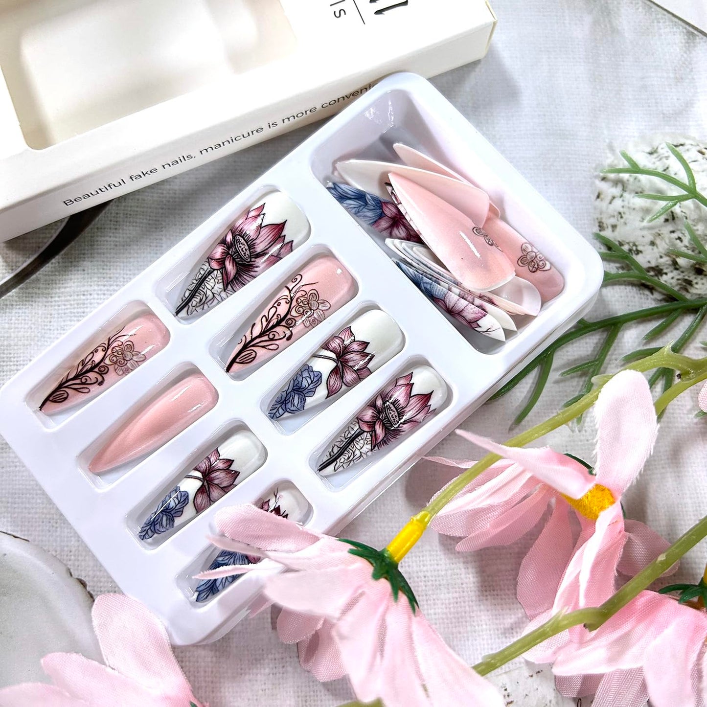 CJDLTS 24Pcs Flower Almond Tip Press on Nails Medium Length Lotus Pattern Design Full Cover Glossy Acrylic False Nail Nude Pink Artificial Stick on Nail Press Ons Blossom Glue on Nails for Women