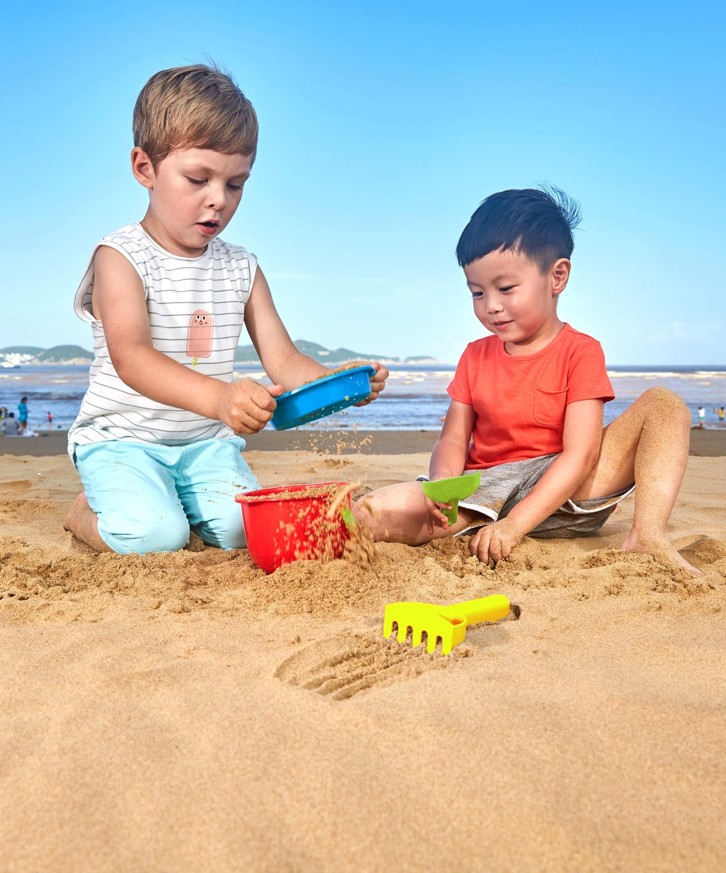 Hape Beach Basics Sand Toy Set Including Bucket Sifter, Rake, and Shovel Toys| Sand Toy Playset for Toddlers 18M+