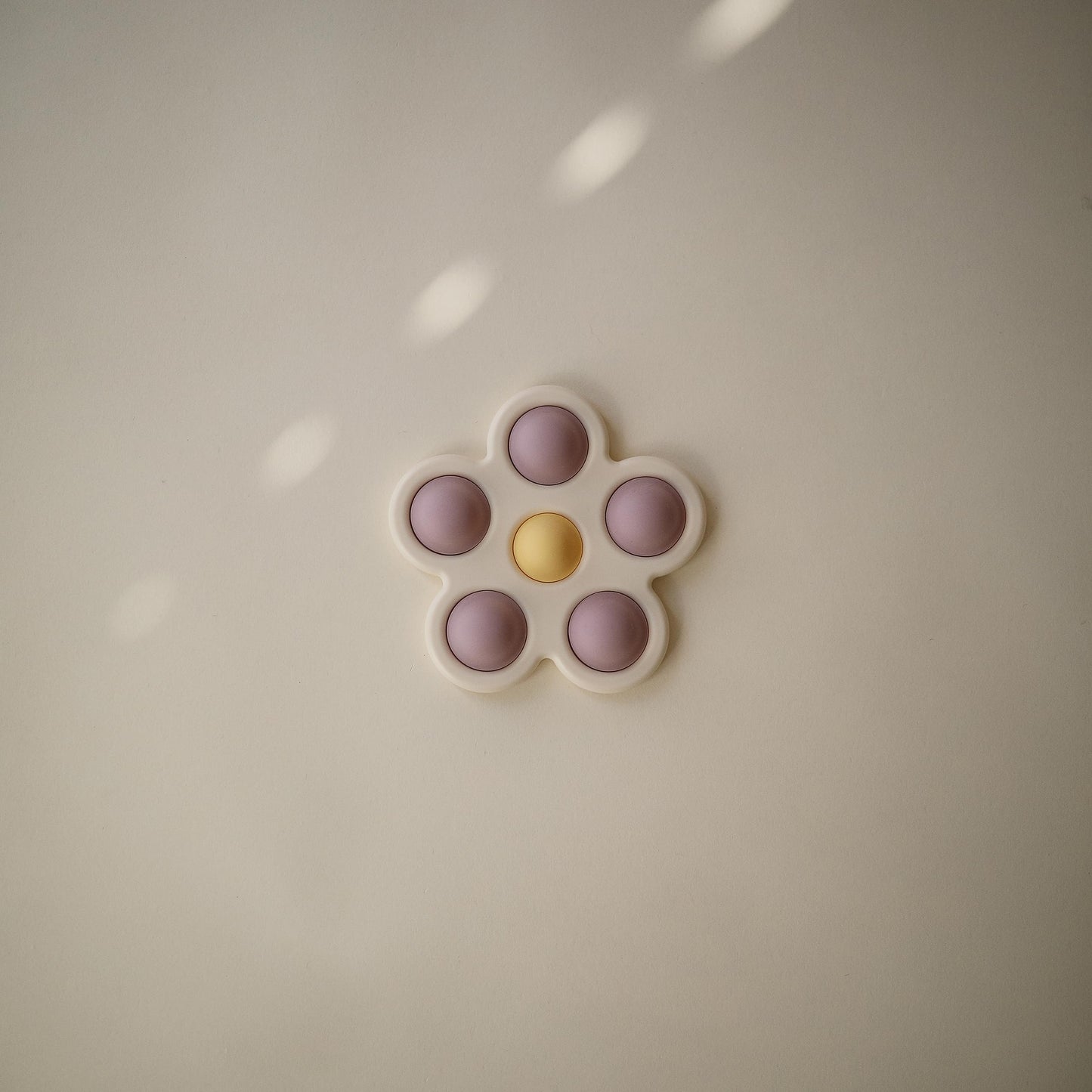 mushie Flower Press Toy (Soft Lilac/Daffodil/Ivory)