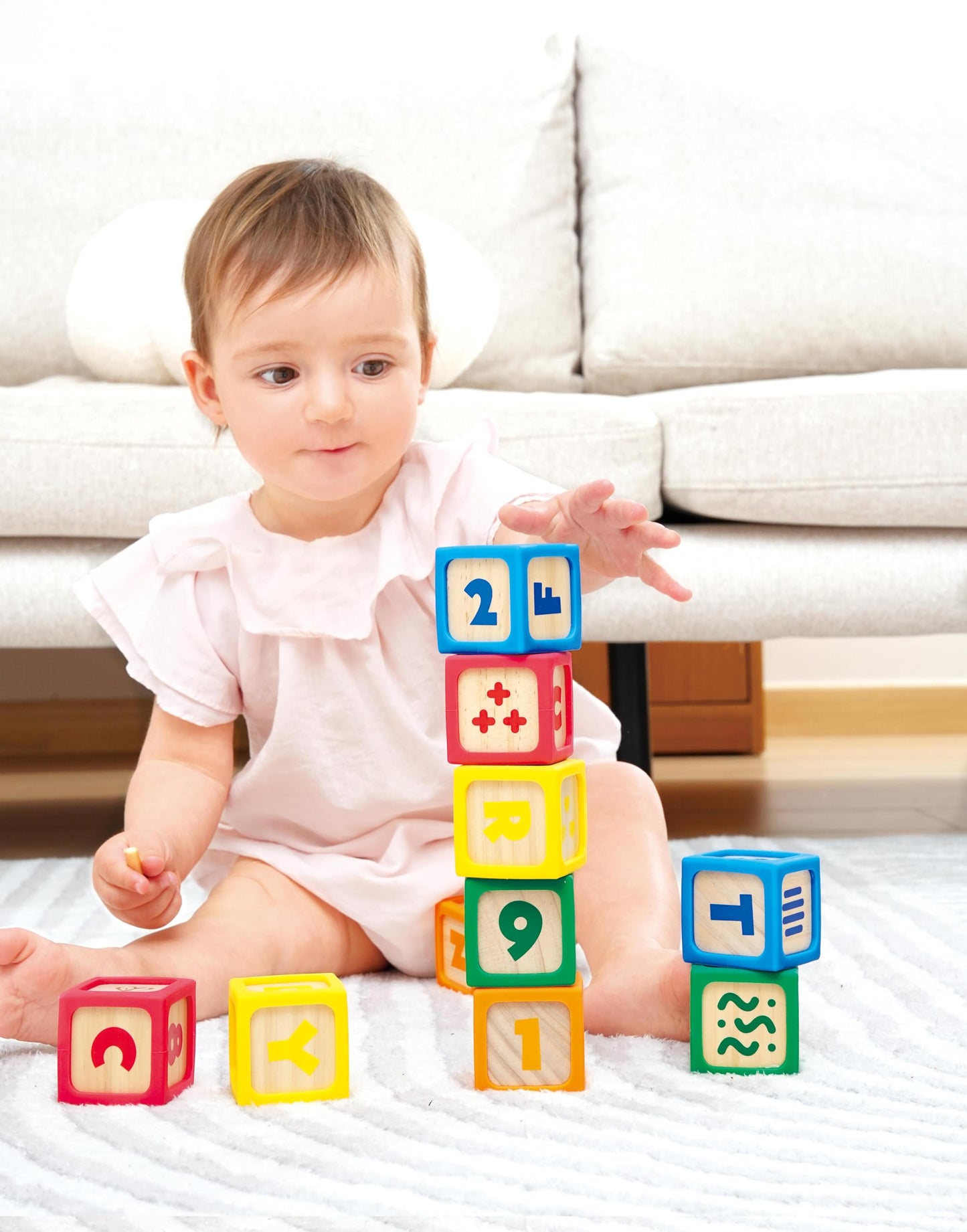 Hape Grip-n-Stack 10-Piece Wooden Building Blocks with Silicone Edges - Educational Alphabet & Number Stacking Toy for Toddlers and Babies - Fine Motor Skills & Sensory Play Set