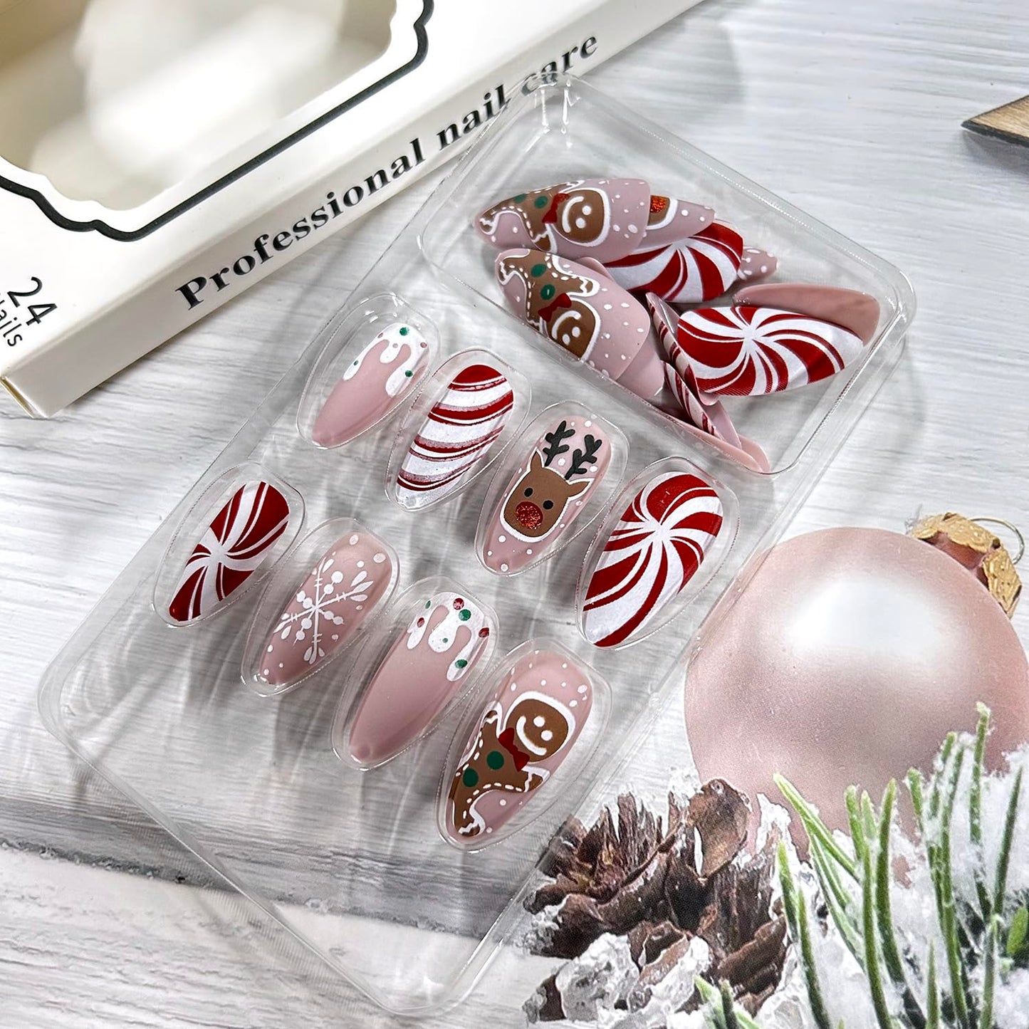 CJDLTS Snowflake Press on Nails Medium Artificial Almond Acrylic False Nails Cute Elk Gingerbread Man Design Stick on Nail Christmas Fake Nail Full Cover Winter Artificial Fingernails for Women 24Pcs