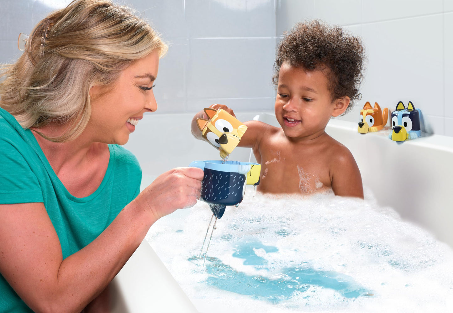 TOMY Toomies Bluey Bath Toys - Bluey's Family Pourers - Includes Chilli, Bandit, Bingo and Bluey Figures - Nesting and Stacking Cups for Bath, Beach or Pool - 4 Count - Ages 18 Months and Up