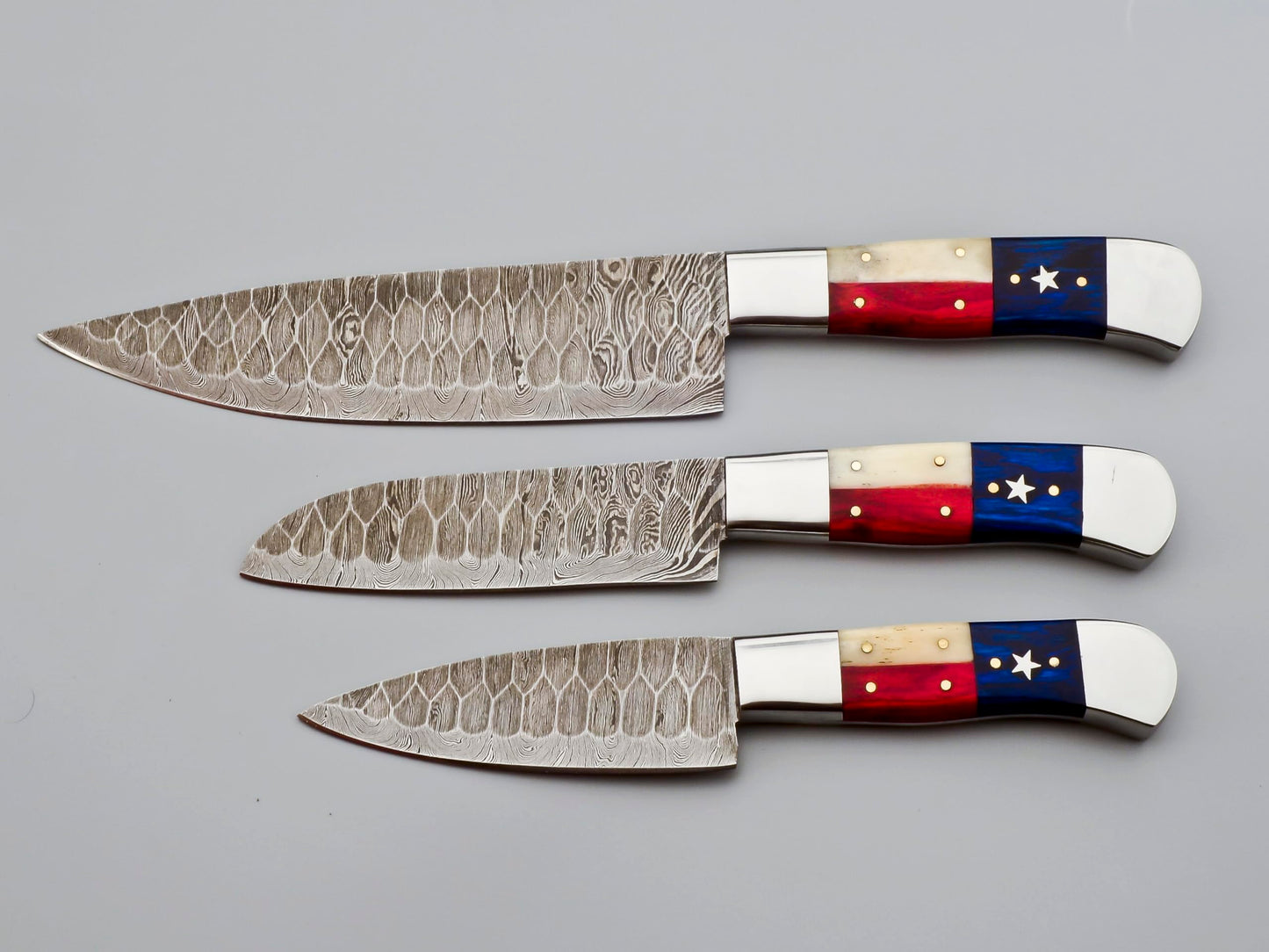 Professional Damascus Chef Knife Set 3 Pcs Custom Handmade Set with Leather Roll - Kitchen Cutlery Set for Home Cooks & Chefs - Ergonomic Texas Flag Handles - Includes Storage Roll (9019)