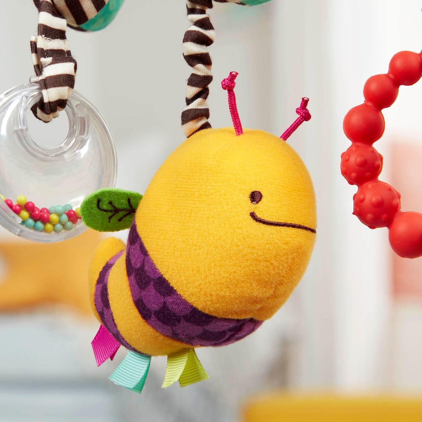 B. toys – Wiggle Wrap for Car Seat, Stroller, Crib – Spiral with 3 Hanging Toys – Rattle, Plush Bee & Teether – Wrap Around Infant – 0+ Months
