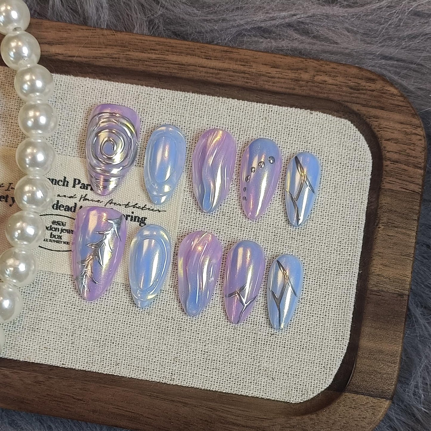 TENPAL Aurora Blue Purple Metallic Nails,Handmade Press on Nails Almond,Full Cover Soft Gel Fake Nails With Tools, Glossy Glitter Glue on Nails With Curves Swirls 10pcs/Box Stick on Nails,XS Size