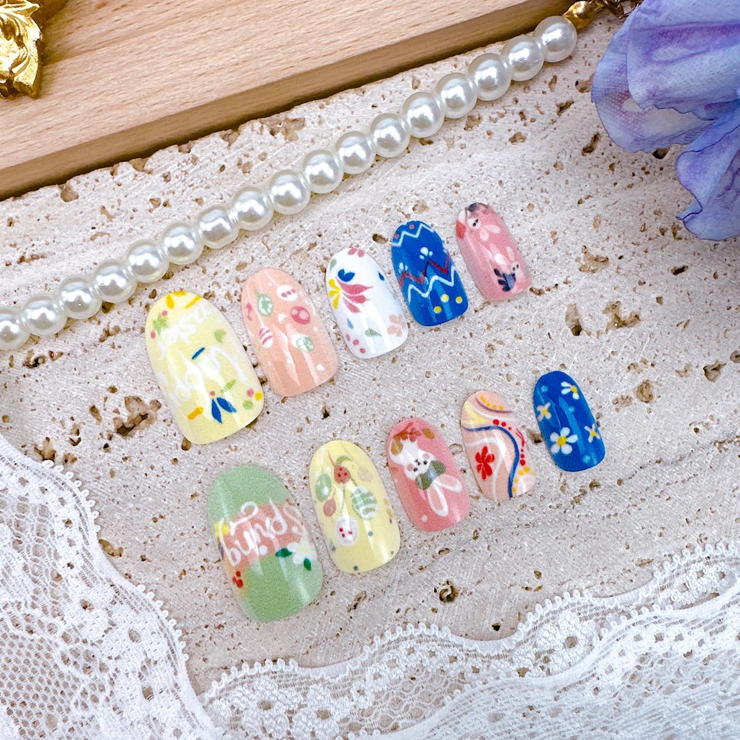 24Pcs Happy Easter Press on Nails Short Oval Fake Nails with Spring Flower Designs Glue on Nails Cute Rabbit Acrylic Nails Easter Egg False Nails Flower Bunny Full Cover Artificial Nail for Women
