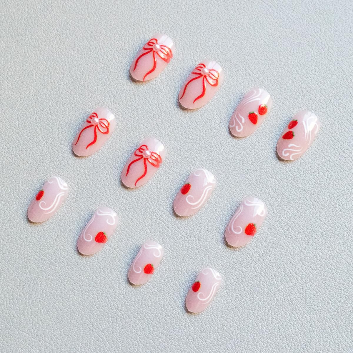 Medium Oval Press on Nails Nude Fake Nails Spring Nails Press ons with Cute Strawberry, Bow Design,Reusable Artificial Nail Full Cover Stick on Nails for Women Manicure 24Pcs