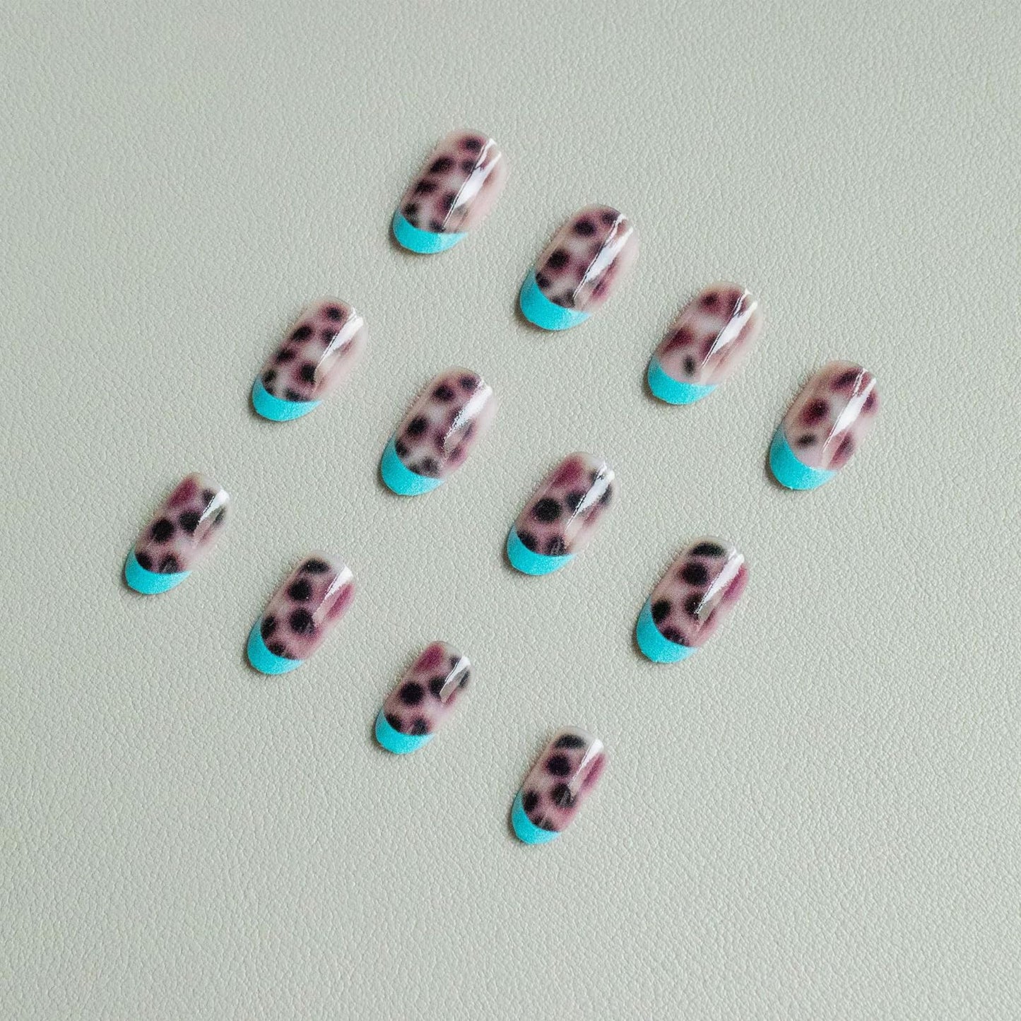 IMSOHOT Press on Nails Short Oval Fake Nails Blue French Tips Acrylic False Nails with Leopard Print Designs Round Glossy Glue on Nails for Women Girls 24Pcs
