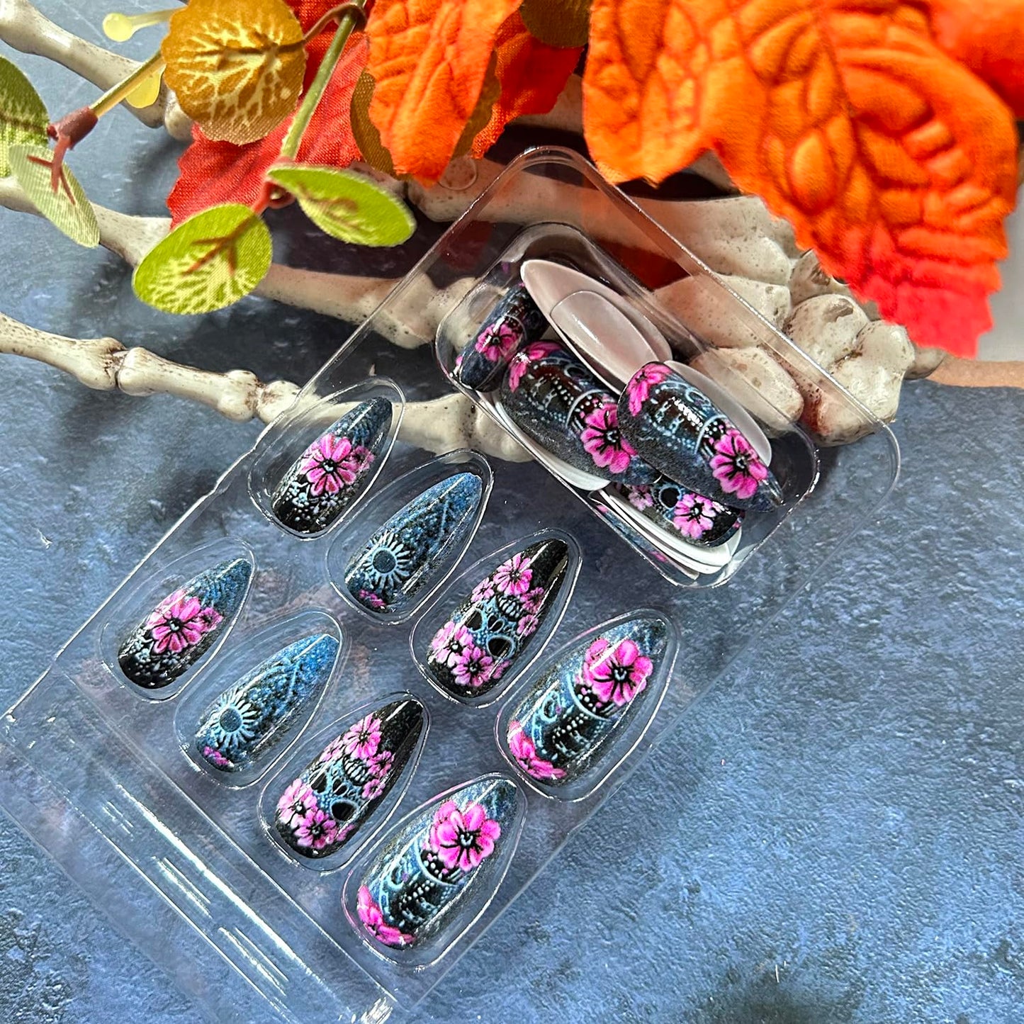 CJDLTS 24Pcs Halloween Flower Skull Press on Nails Medium Pink Floral Skull Pattern Design Halloween Nail Full Cover Glossy Artificial Acrylic False Nail French Almond Medium Glue on Nails for Women