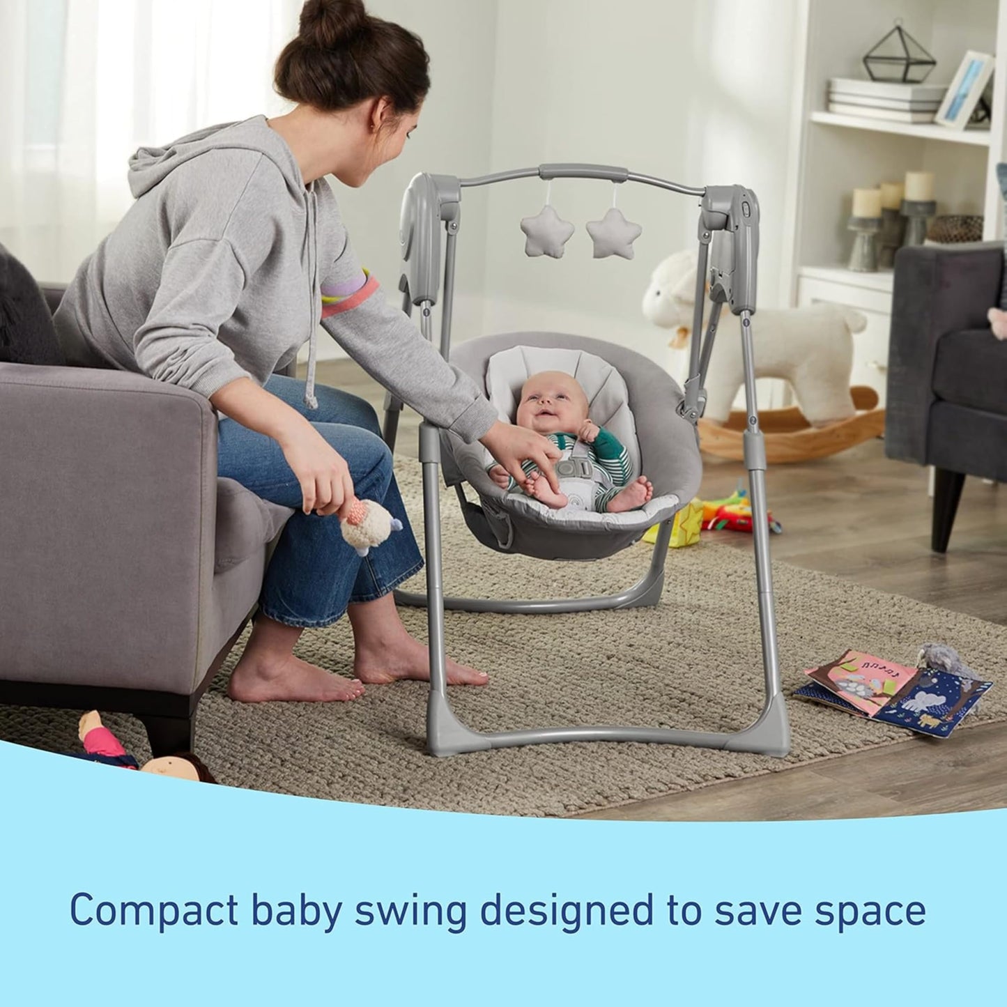 Graco Slim Spaces Compact Baby Swing, Space Saving Portable Bay Swing with Height Adjustable Legs & Soft Toys, Reign