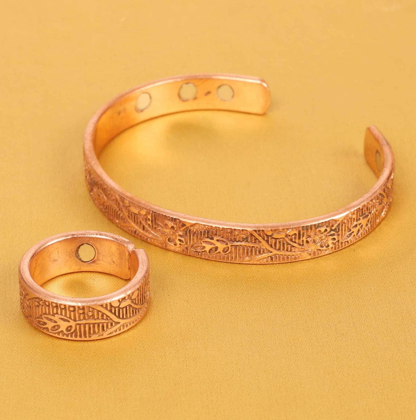 Touchstone Copper Magnetic Hand Forged With Solid And High Gauge Engraved Petals Pattern Minimalistic Elegance Pure Copper Bracelet And Matching Ring In Natural Tone.