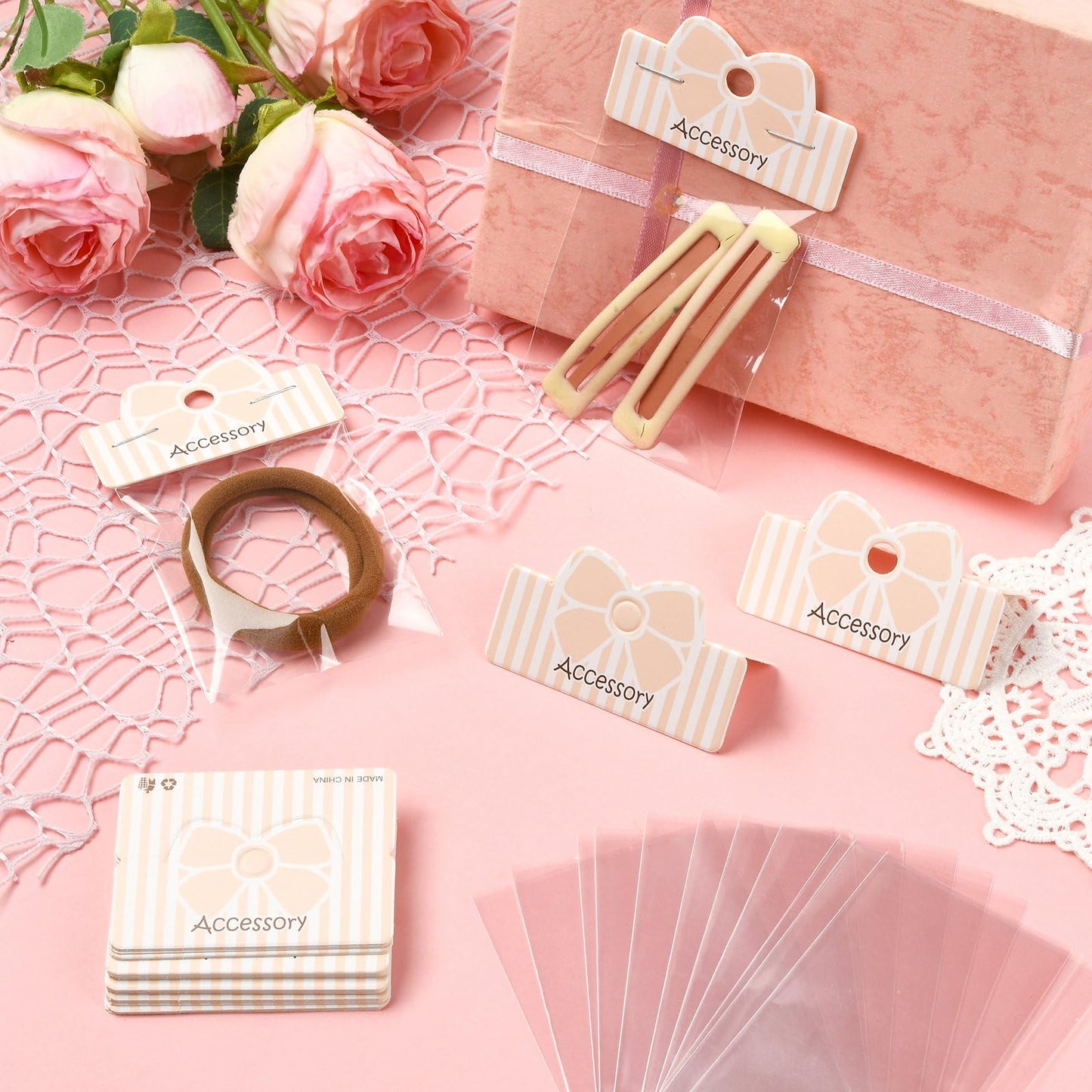 Gelirda 50 Sets Packaging Pouch with Foldable Header Cards Bowknot Printed Paper Cards & Rectangle Cellophane Bags for Jewelry Display