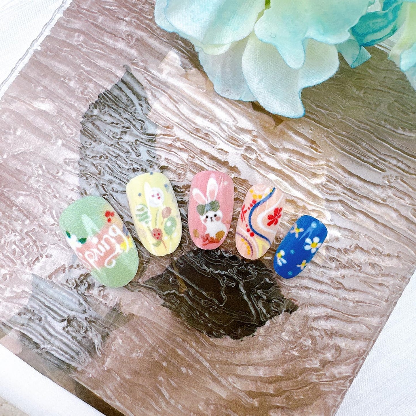 24Pcs Happy Easter Press on Nails Short Oval Fake Nails with Spring Flower Designs Glue on Nails Cute Rabbit Acrylic Nails Easter Egg False Nails Flower Bunny Full Cover Artificial Nail for Women