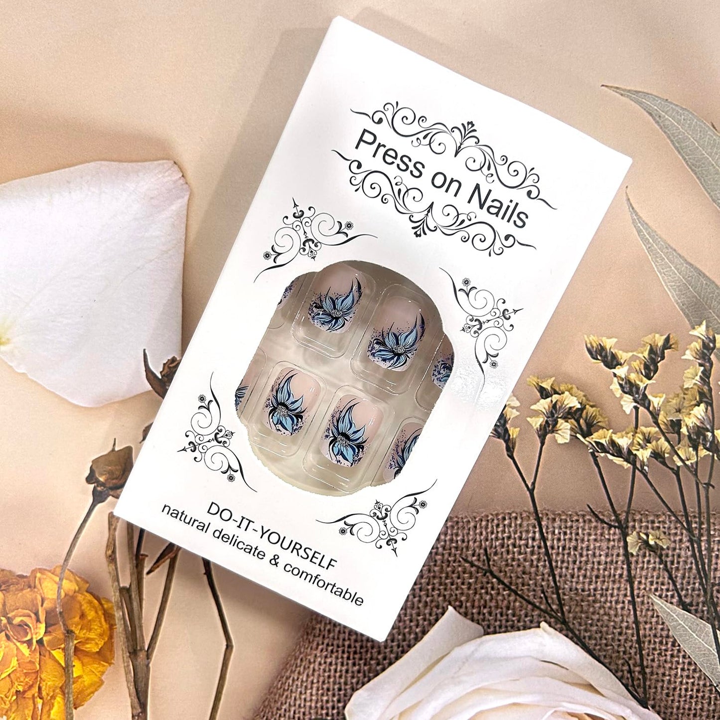 TBRZTR Blue Flower Press on Nails Short Square Artificial Coffin Nails Press Nails with Charm Acrylic Nails Nude False Nails Full Cover Glue on Nails Reusable Stick on Nails for Women 24Pcs