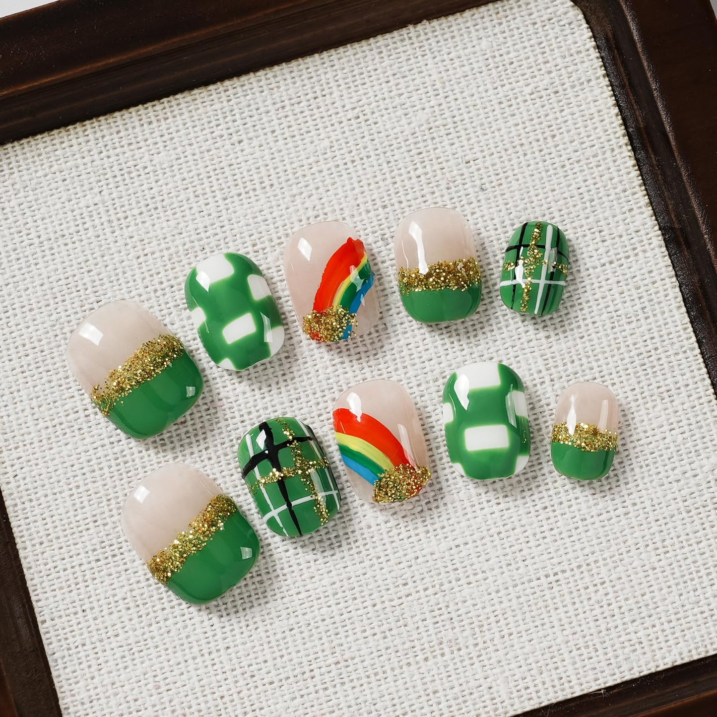 Tesytto Extra Short Press On Nails - Nude Base with Green French Tips & Gold Glitter, Hand-Painted Plaid & Rainbow,Easy to Apply & Remove (Size M)