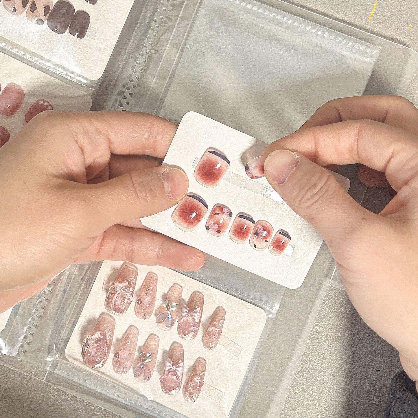 Press On Nail Storage Book Empty Press On Nails Packing Book Set Nail Organizer Display Accommodate 42 Pairs Press On Nails with 10m Double-Sided Adhesive Tape and 50pcs Nail Display Cards