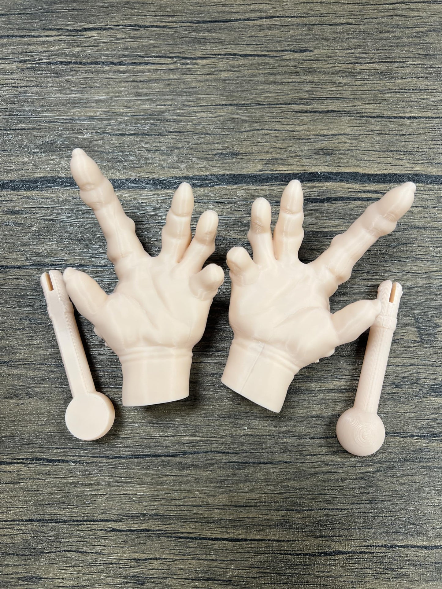 Munnygrubbers - 1 Pair Tiny Hands with Sticks - Mini Little Hand Stick Puppet - Halloween Costume - Strong Hand Prop - Scary Movies - Novelty Gift - TikTok Famous - (Creepy 1x Set)