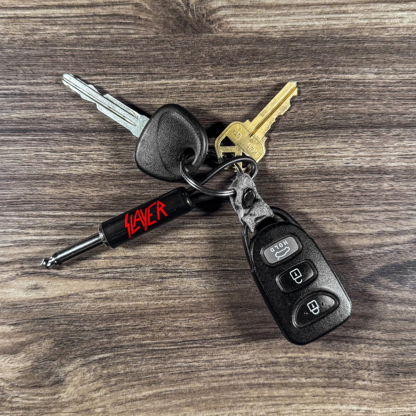 P Pluginz Jack Rack Wall mounting Key Hanger. Includes 4 Guitar Plug Keychains and Wall mounting Hardware. (Slayer)