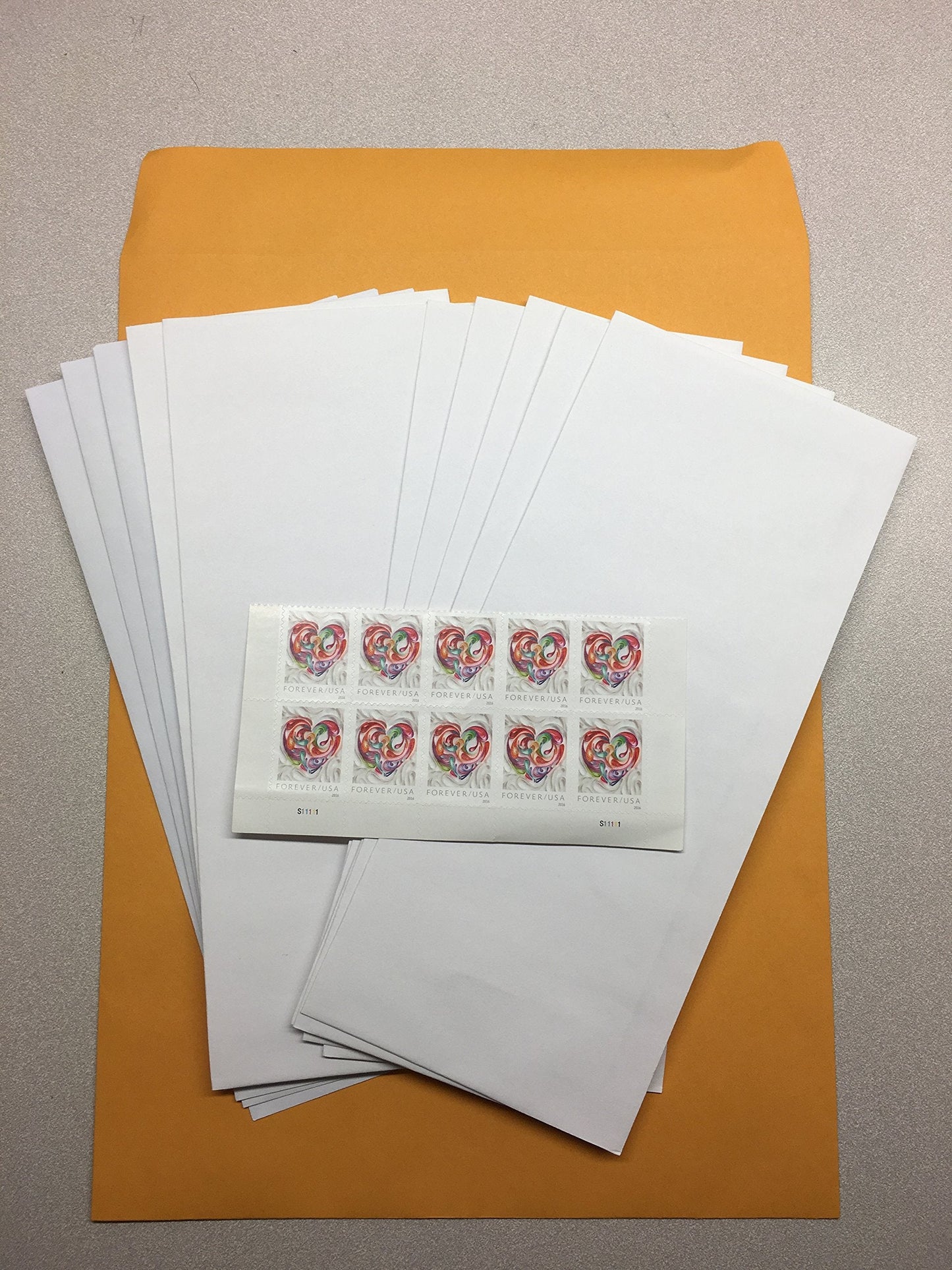 10 Forever Stamps with 10 Peel-and-Sticky Envelopes (Stamp Design May Vary)