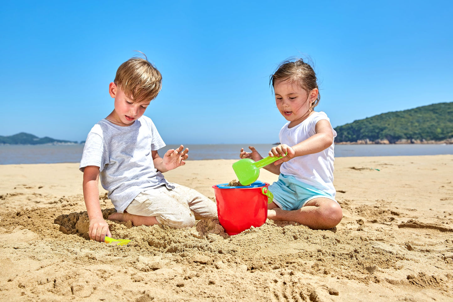 Hape Beach Basics Sand Toy Set Including Bucket Sifter, Rake, and Shovel Toys| Sand Toy Playset for Toddlers 18M+