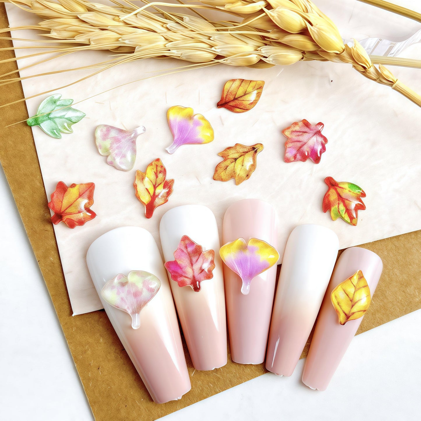 100 Pcs Fall Nail Art Charms Multi Shape Resin Maple Leaves Nail Charms 3D Flat Back Autumn Maple Leaf Ginkgo Leaf Design Nail Art Rhinestones Jewelry for DIY Thanksgiving Nail Decoration
