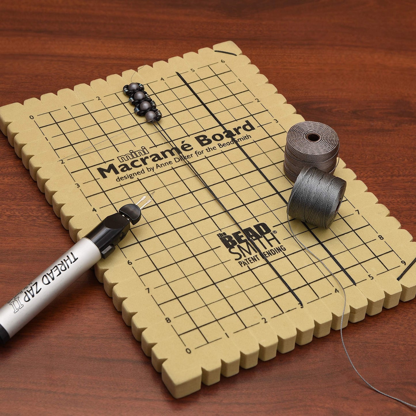 The Beadsmith Mini Macrame Board, 7.5 x 10.5 inches, 0.5-inch-Thick Foam, 6 x 9 Grid for Measuring, Bracelet Project with Instructions Included, Create Macrame and Knotting Creations