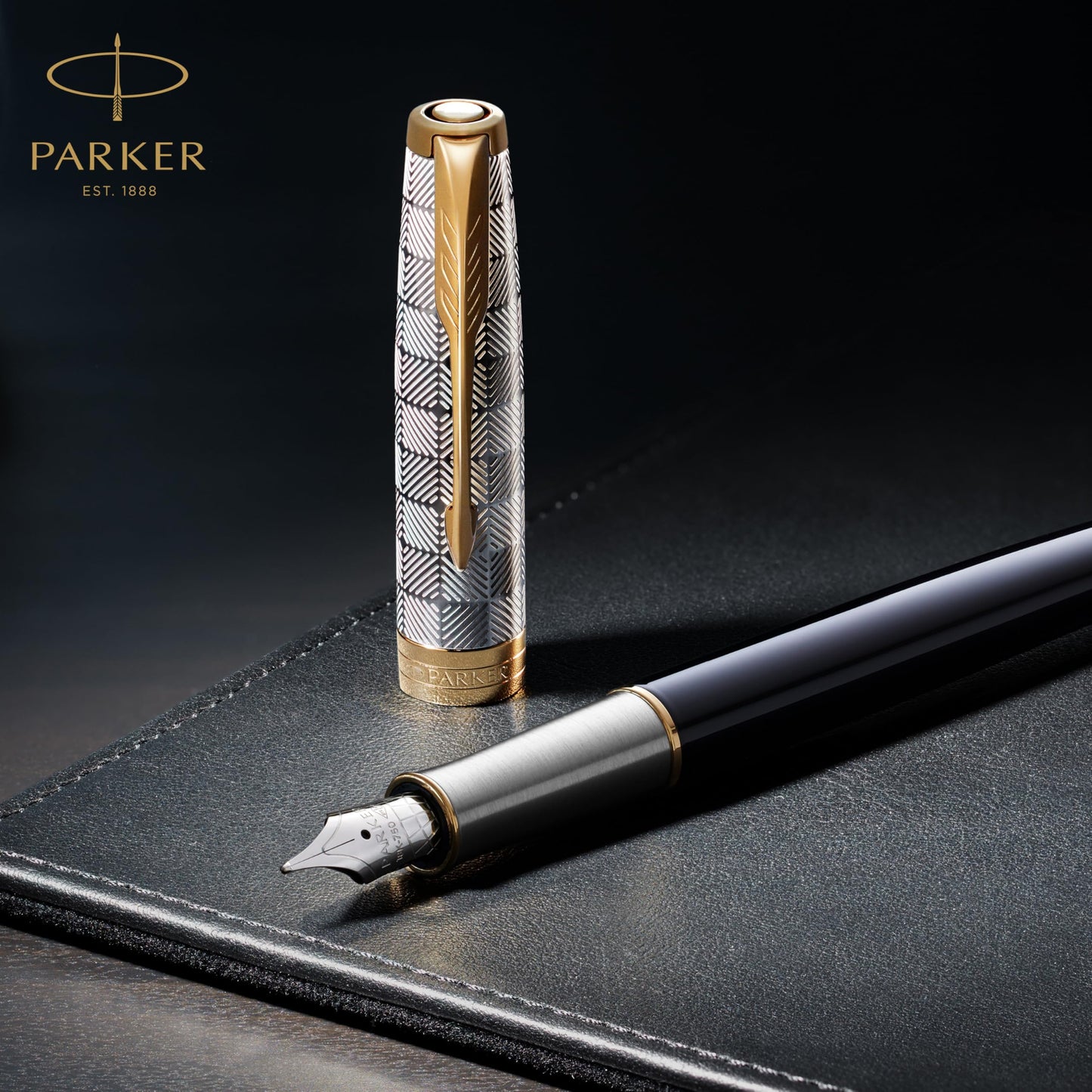 Parker Sonnet Fountain Pen Chiseled Silver with Gold Trim Solid 18k Gold Fine Nib (1931489)
