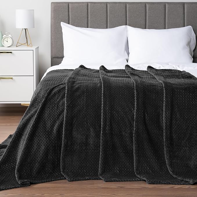 PAVILIA Soft Fleece Solid Black Throw Blanket for Couch, Lightweight Plush Warm Blankets for Bed, Fuzzy Cozy Flannel Blanket Throw for Sofa, Travel, Jacquard Pattern, Black, 50x60 inch