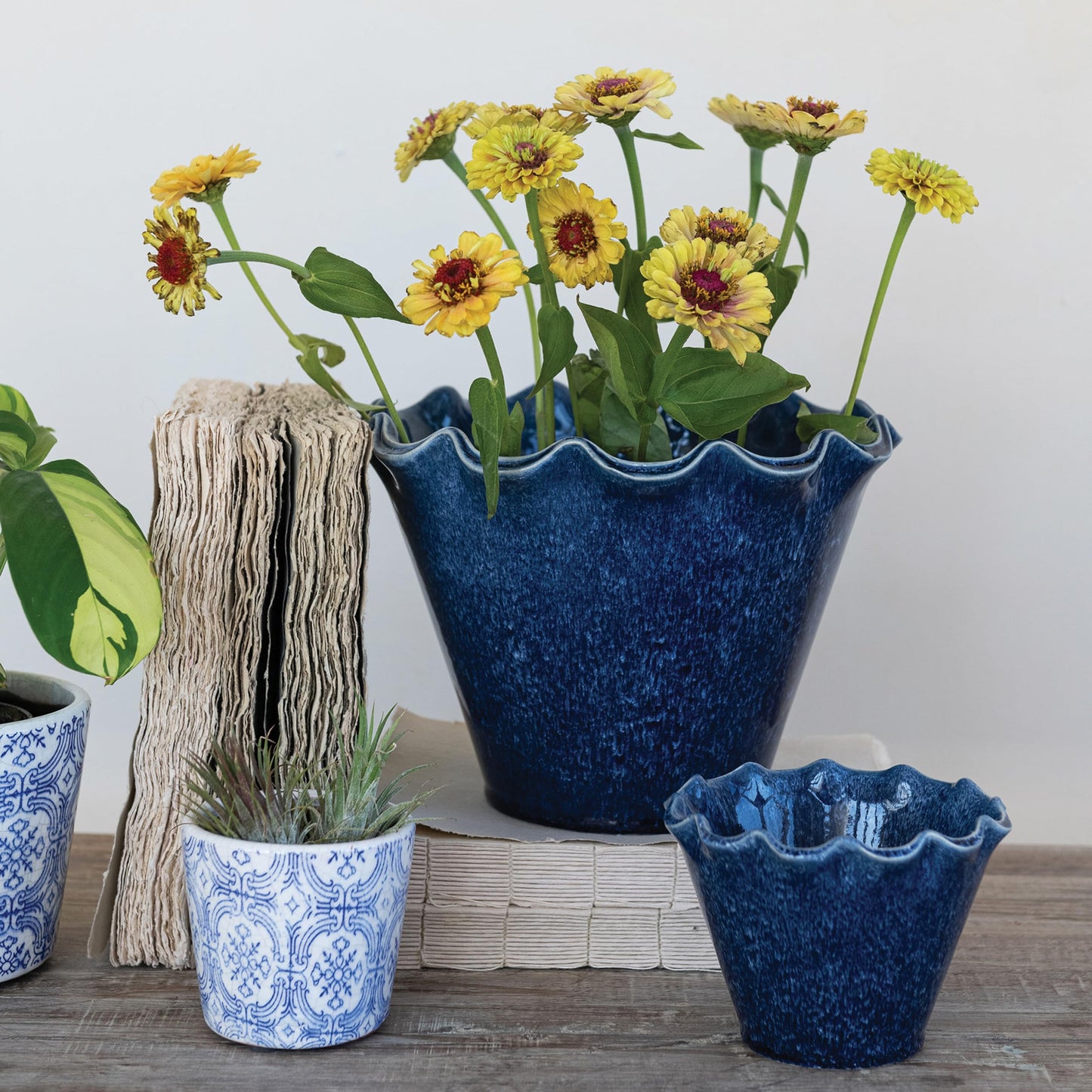 Creative Co-Op Stoneware Planter with Ruffled Edge and Drainage Hole with Reactive Glaze, Blue