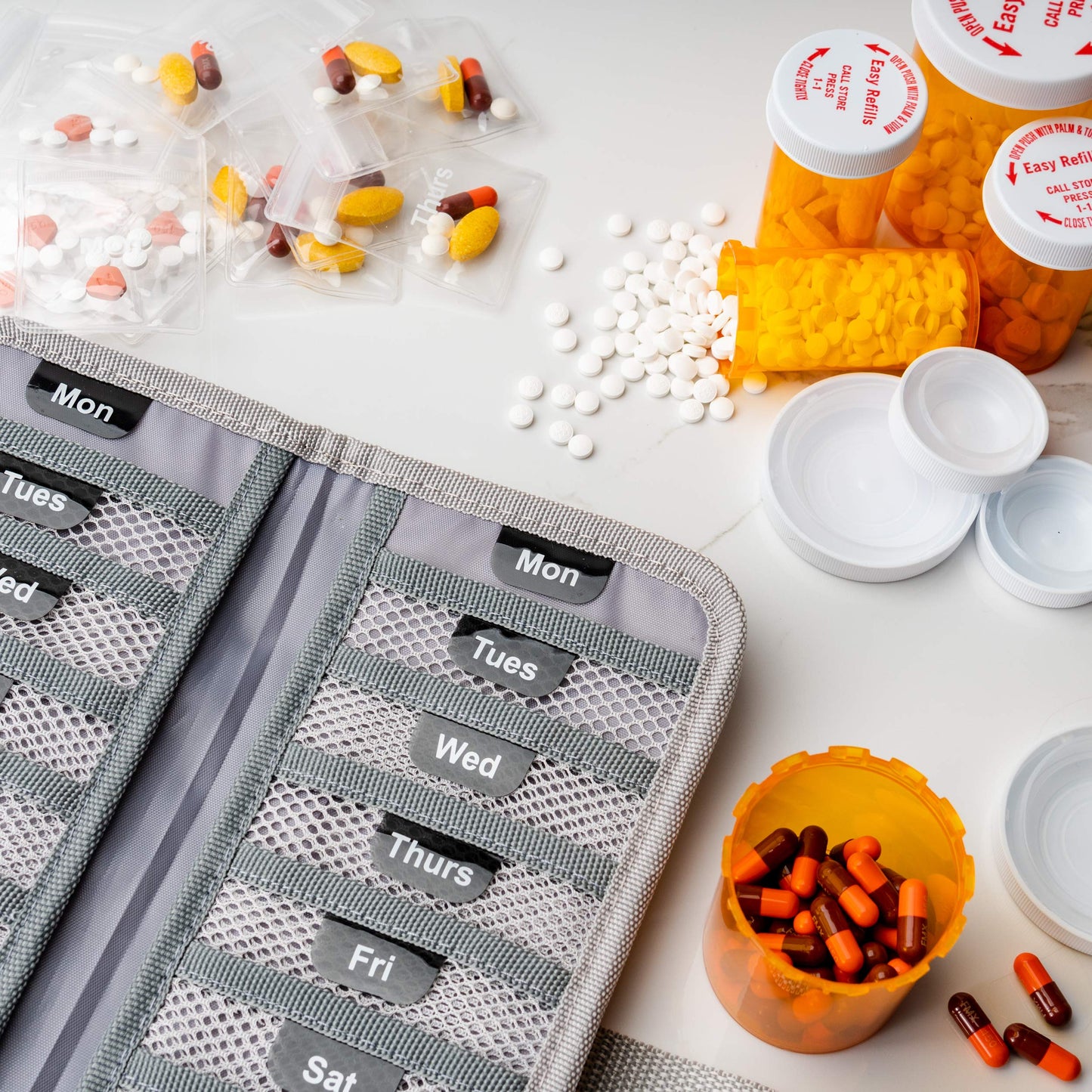 TeloTravel AM/PM Bi-Folding Pill Organizer + Supplement Case for OTC Medicine, Prescription + Vitamins - 14 Labeled Monday-Sunday Slide Lock Pouches, Grey Travel Pill Case