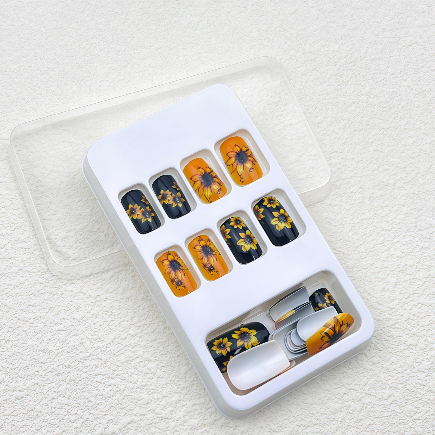 24Pcs Black Press on Nails Medium Coffin Spring with Cute Sunflower Design Glossy Fake Nails Full Cover Orange Sunflower Acrylic Nails for Women Girls DIY Manicure Decorations