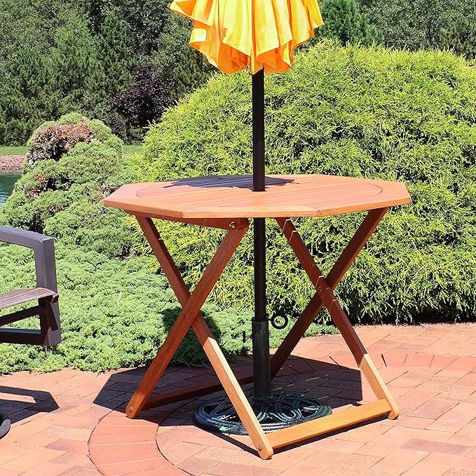 Sunnydaze Folding Meranti Wood Outdoor Dining Table with Umbrella Hole - Foldable Teak Patio Table - Teak Oil Finish - Octagon